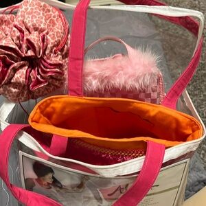 purses, baby doll bag, stuffed pet bag.